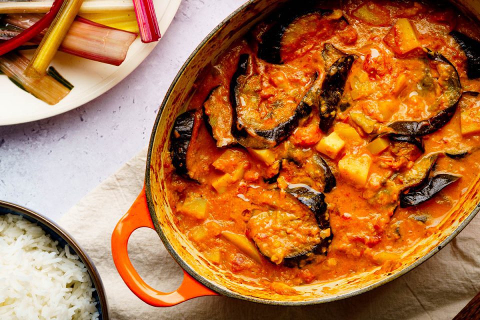Aubergine and potato curry close on pot